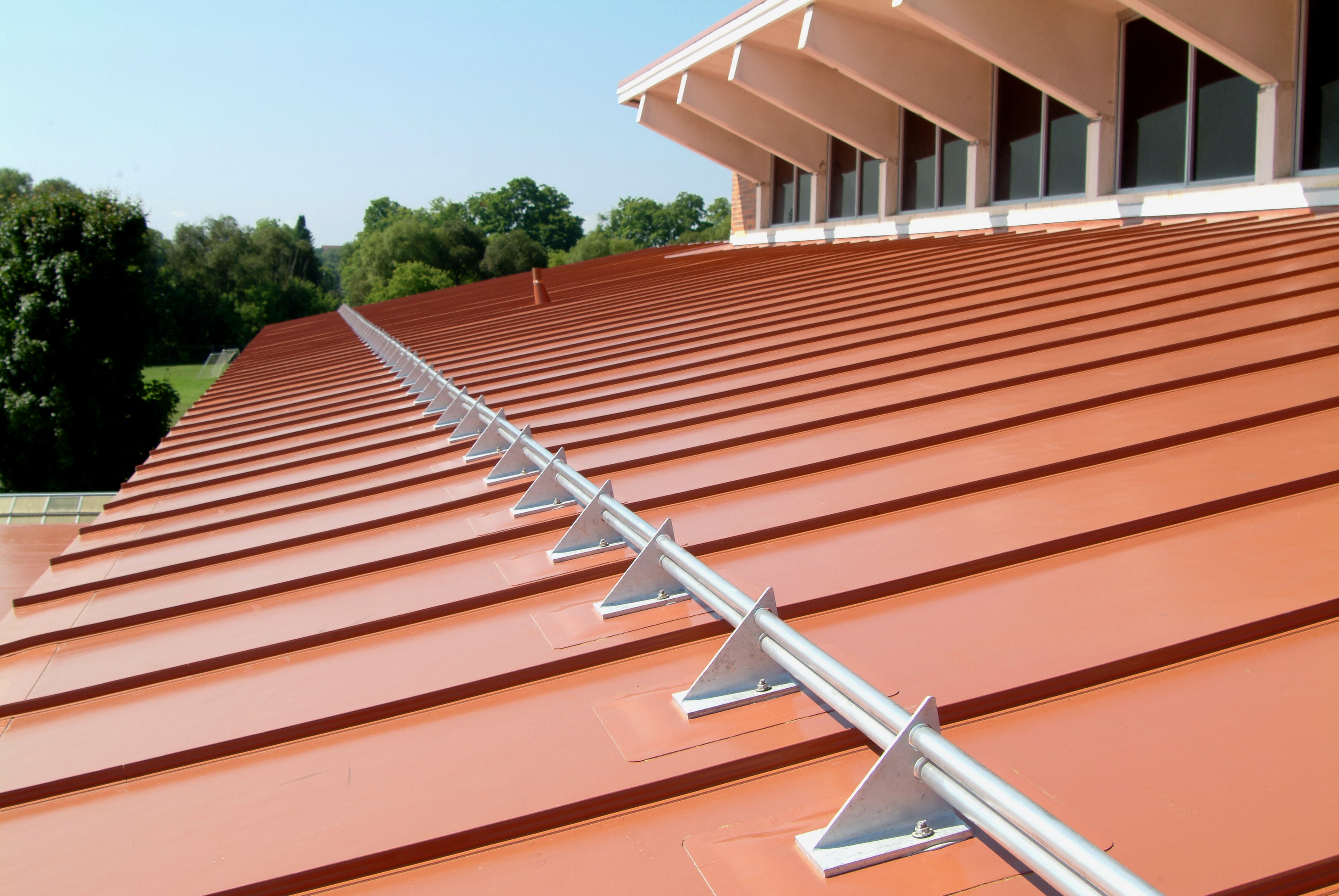 PP115-AL-2Pipe_Memb_SikaDecorRib_TraverseBayAreaIntermediateSchoolDistrict_TraverseCityMI_IMG_2165